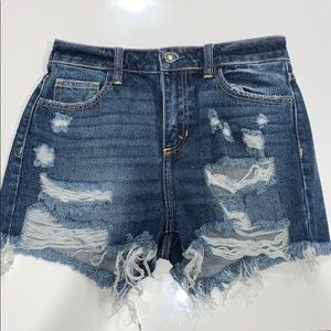 Trendy ripped jean shorts.